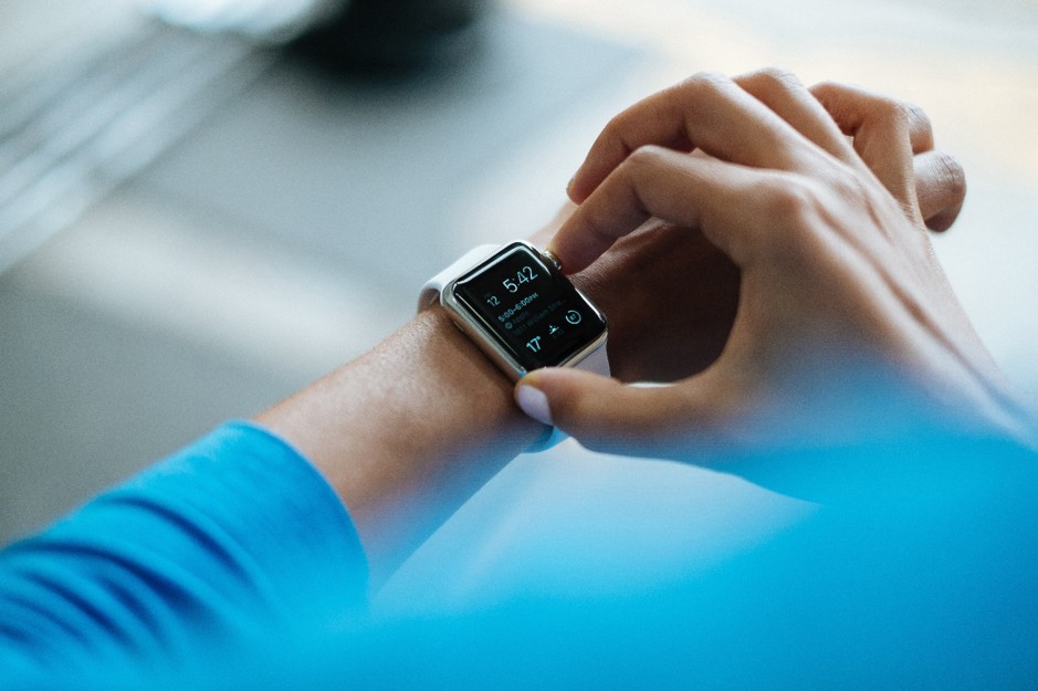 Woman checking her smart watch