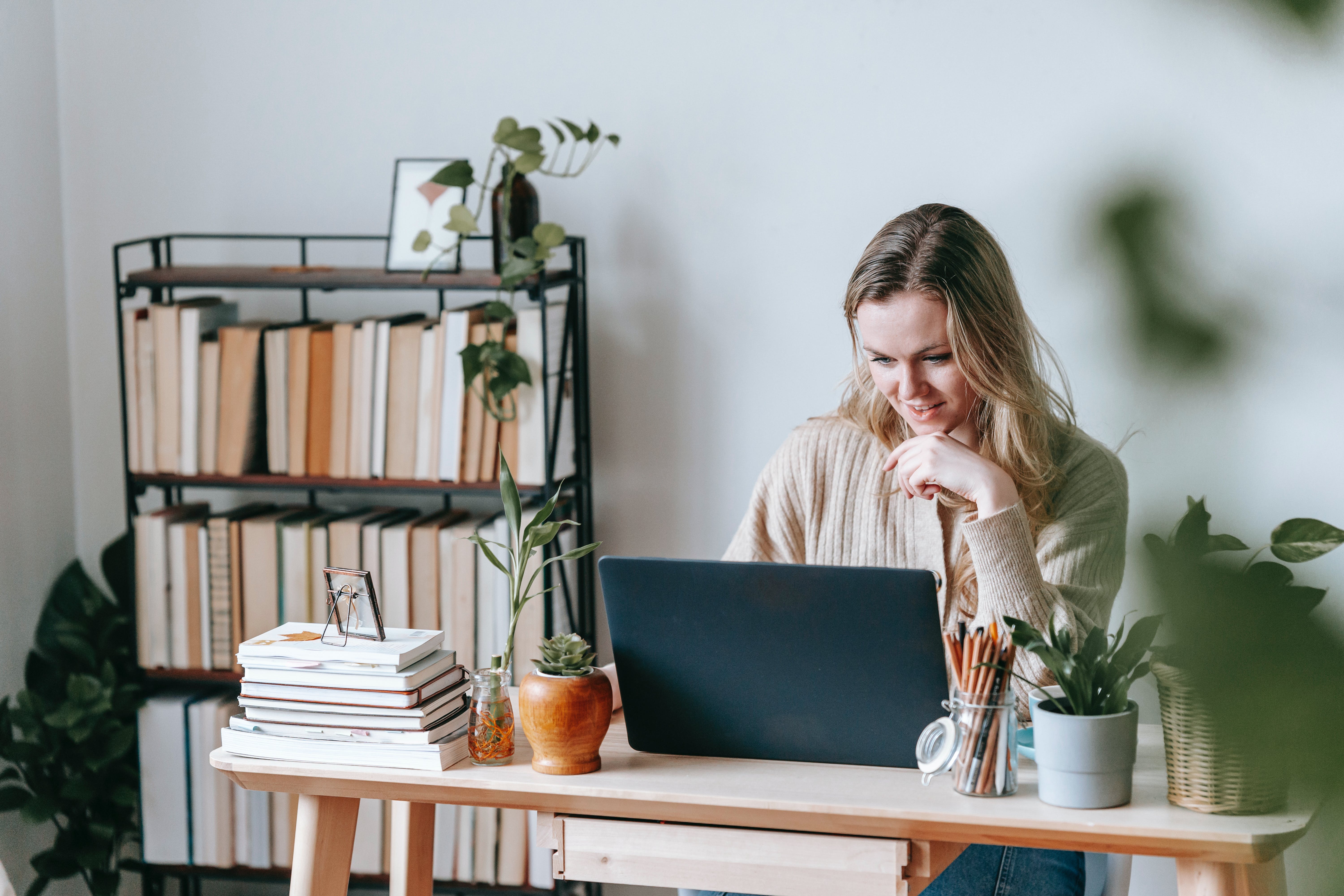 Woman working from home, represent remote employee engagement