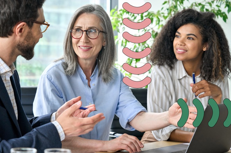 Two women and a man chatting