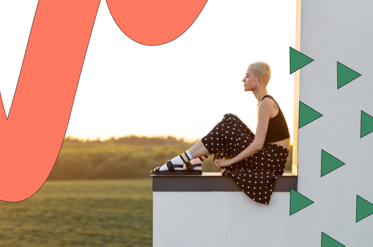 Woman sitting admiring landscape view 